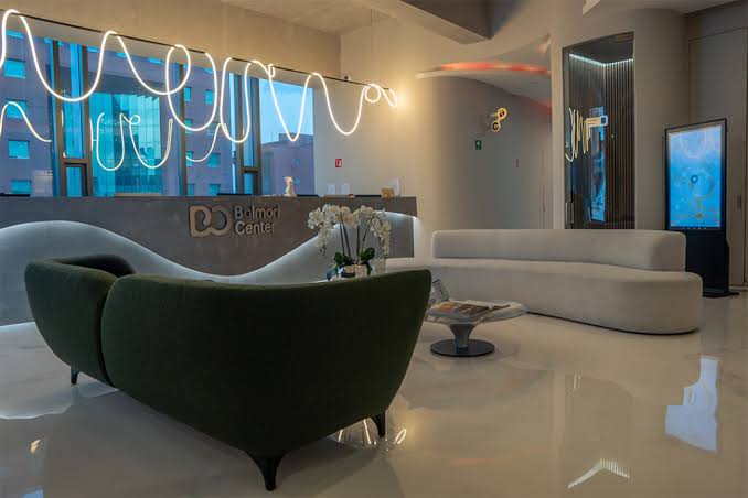 Balmori Center reception with signature neon lighting